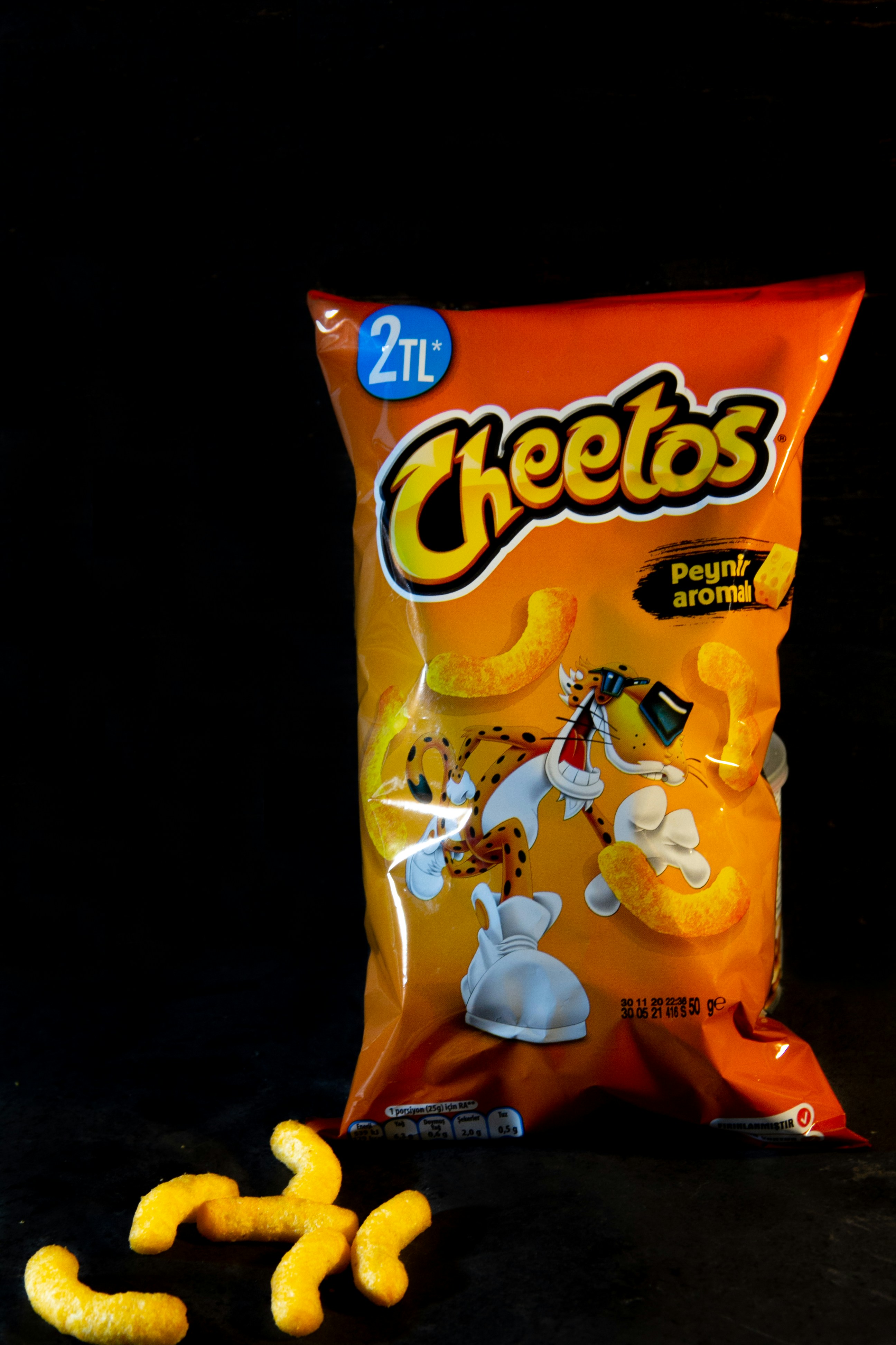 Cheetos crunchy cheese puffs in an orange bag