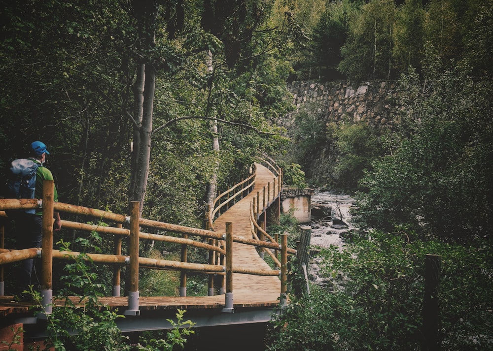 brown wooden bridge over river