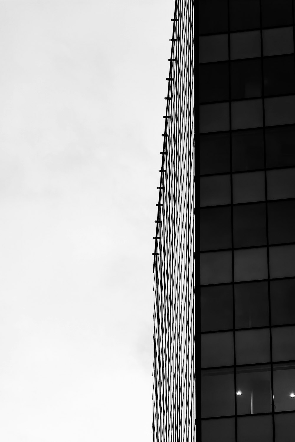 grayscale photo of high rise building