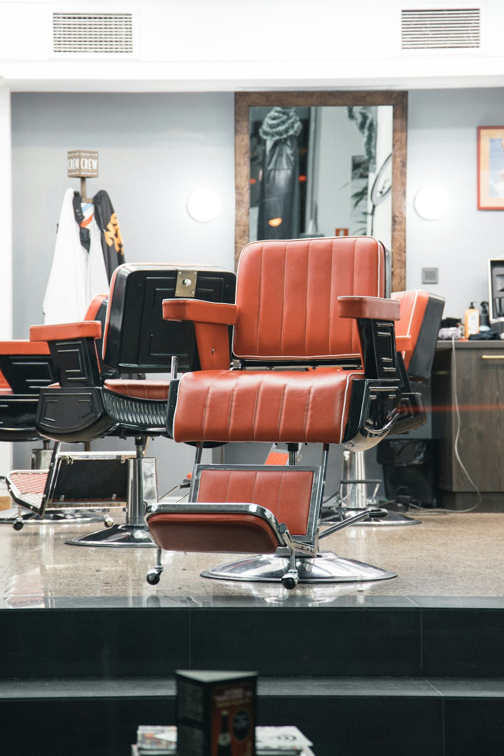 red and black leather office rolling chair