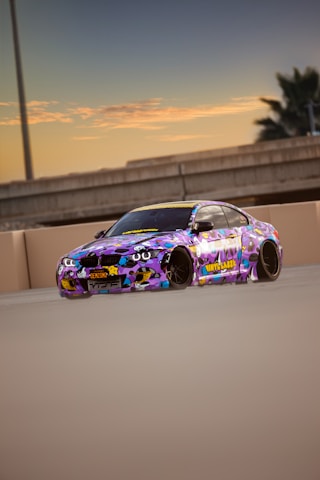 purple and black porsche 911
