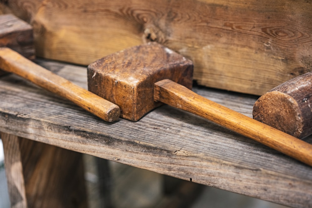 brown wooden handle on brown wooden plank