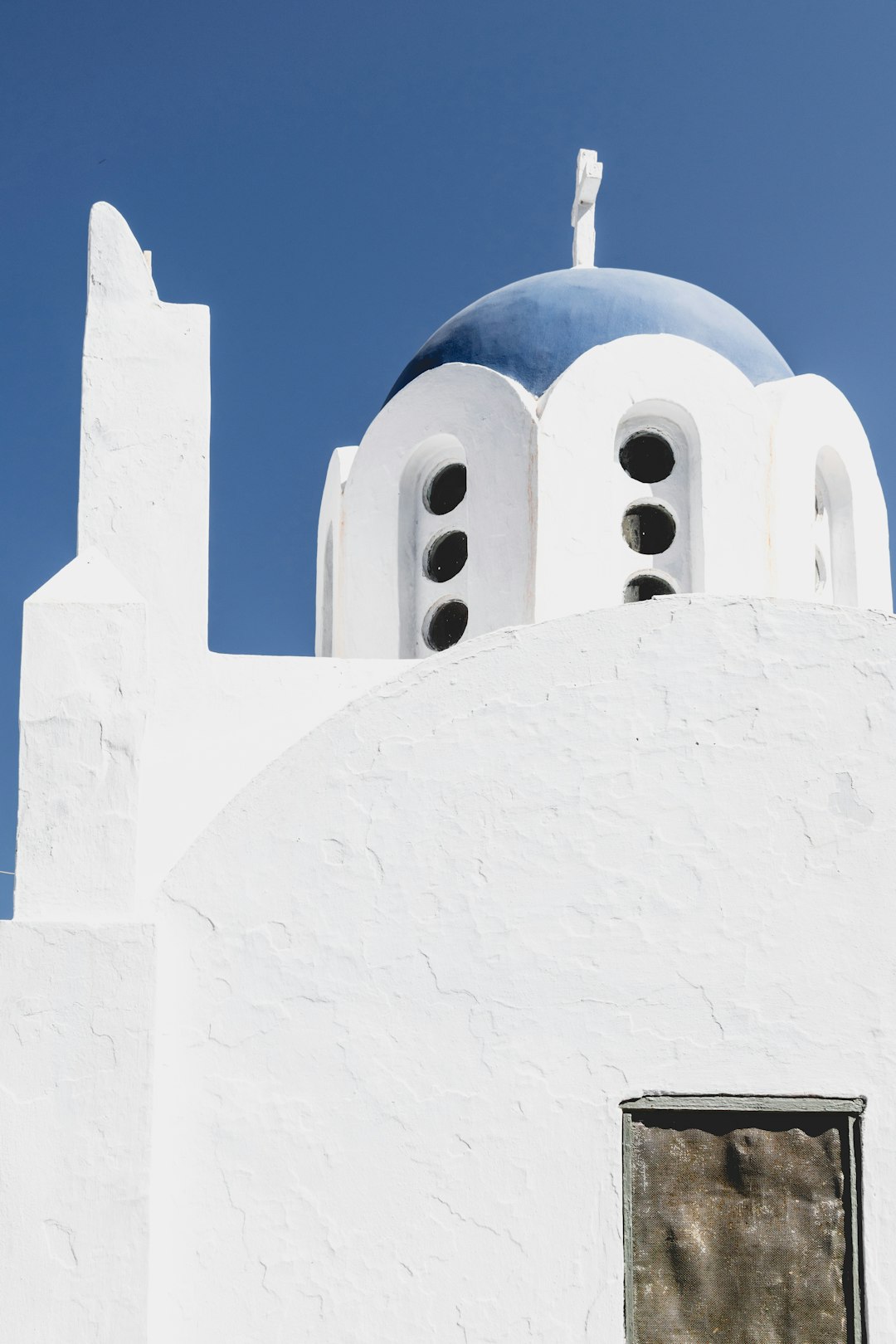 white concrete building under blue sky during daytime