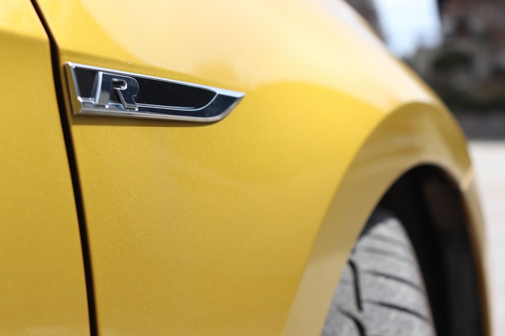 yellow and silver nissan car