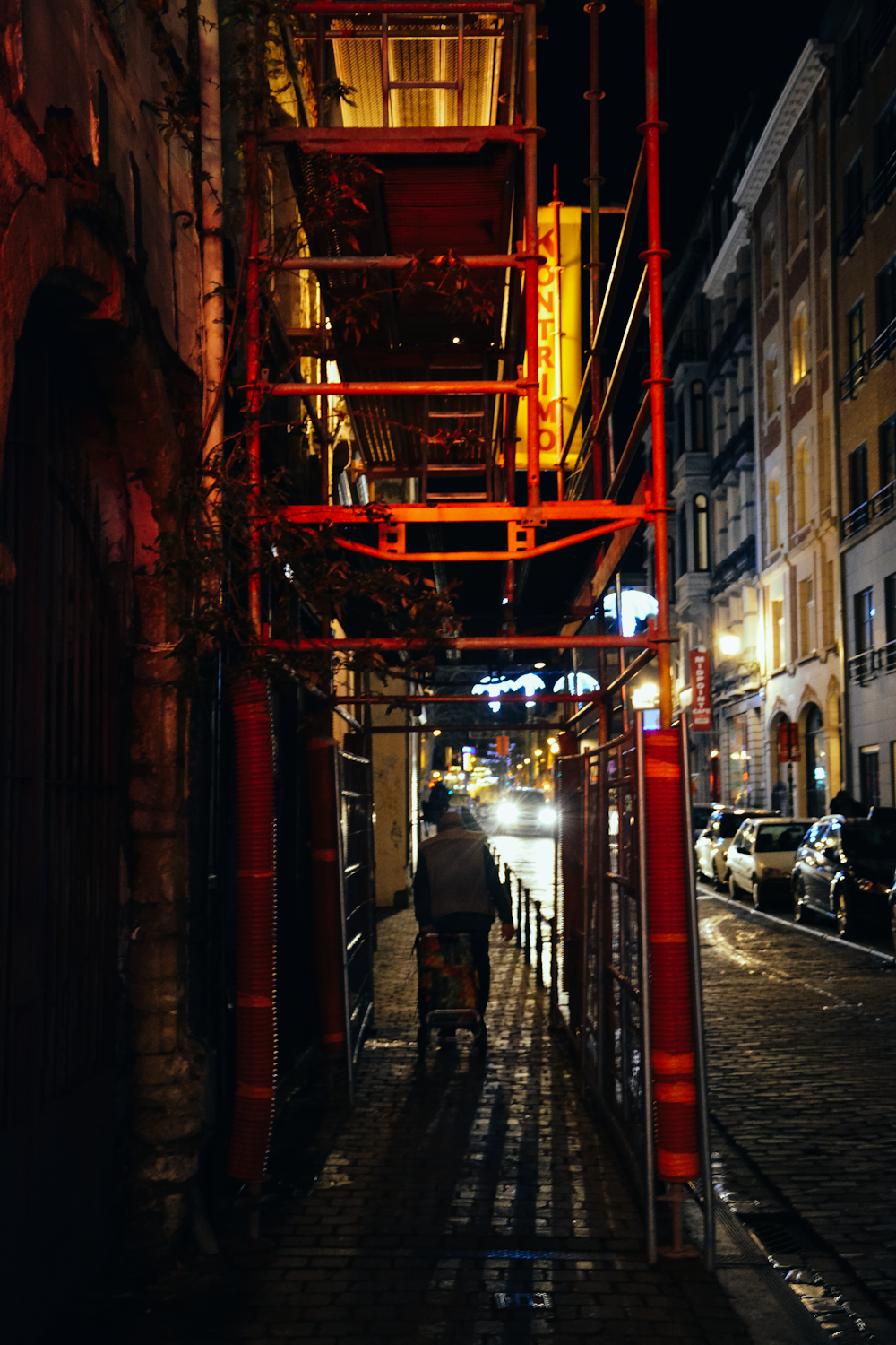 people walking on street during night time