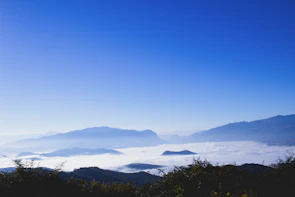 Panoramic view of misty mountains seen from the Rabbit House veranda.