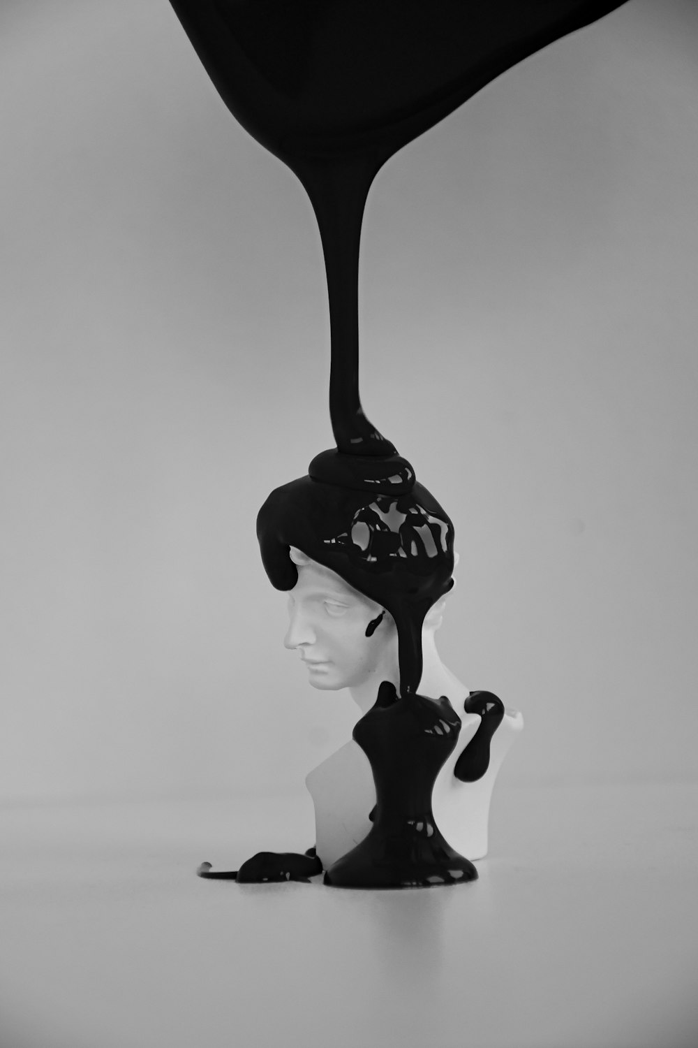 woman in black dress figurine
