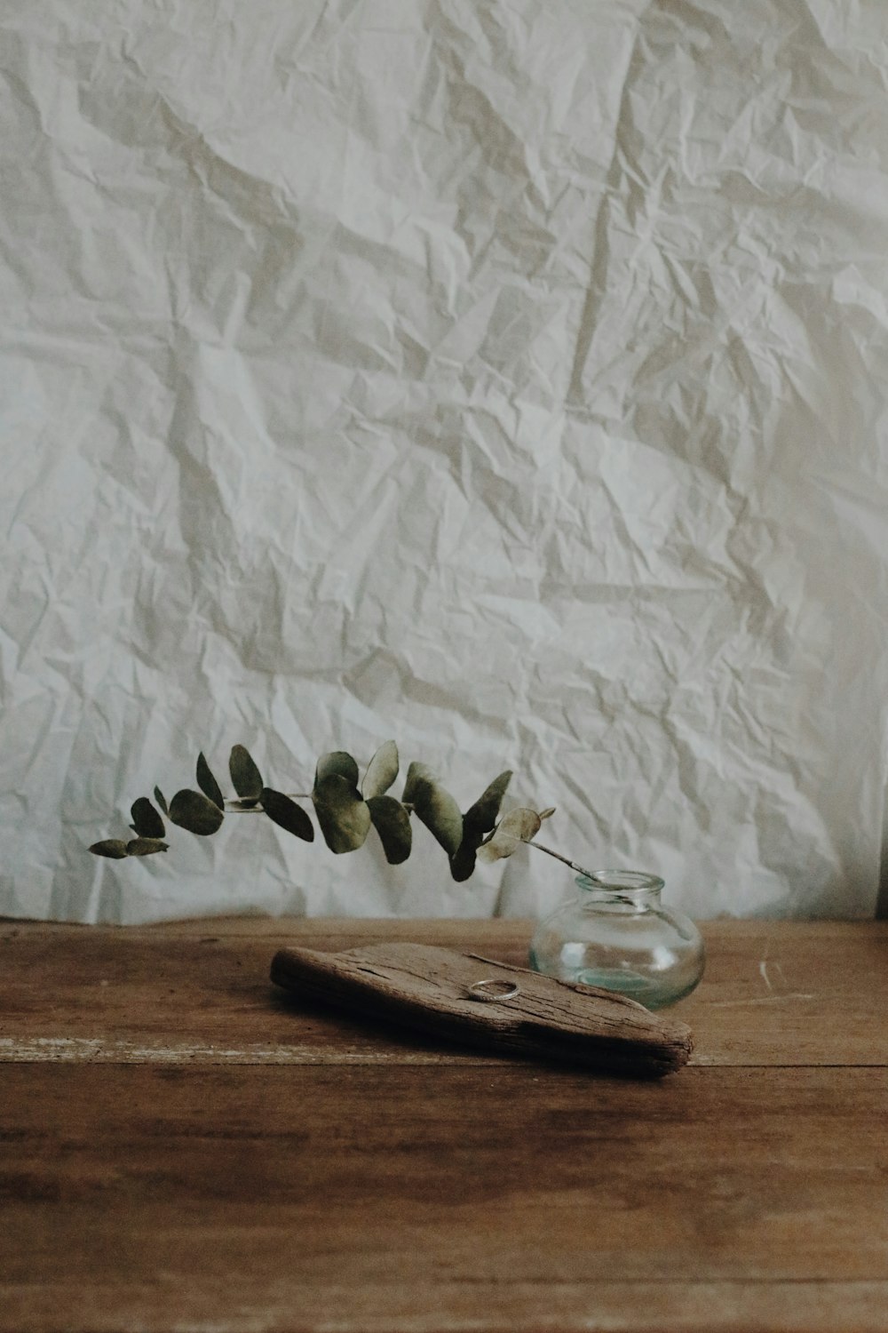 green and black fruits on brown wooden chopping board