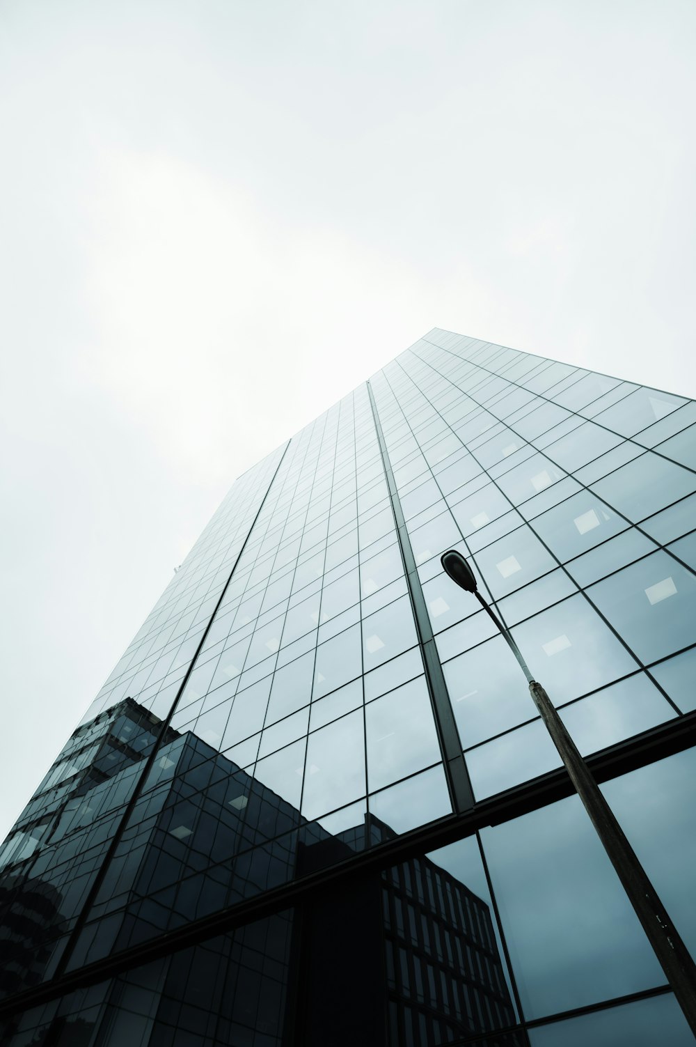 low angle photography of high rise building