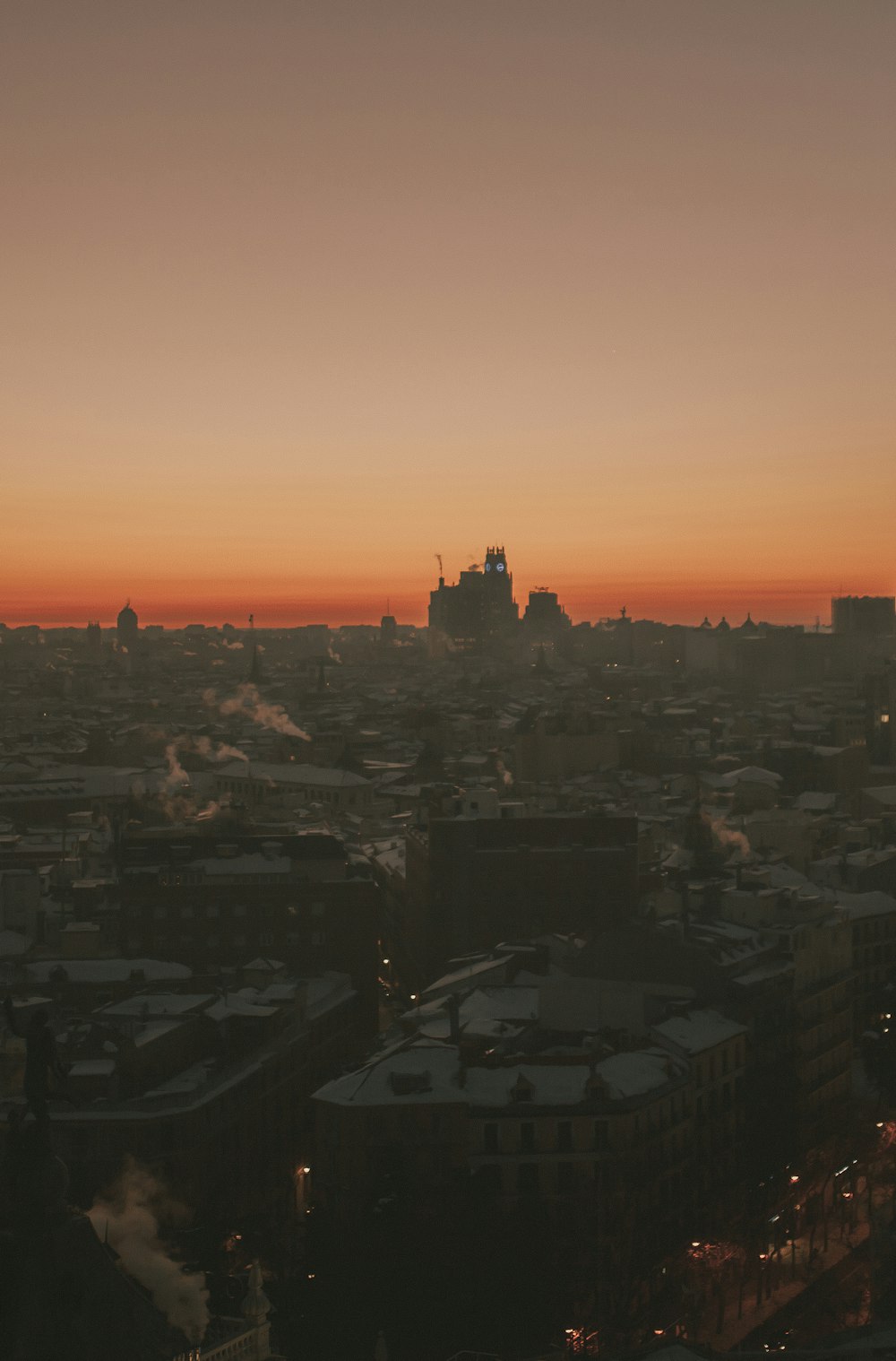 city skyline during orange sunset