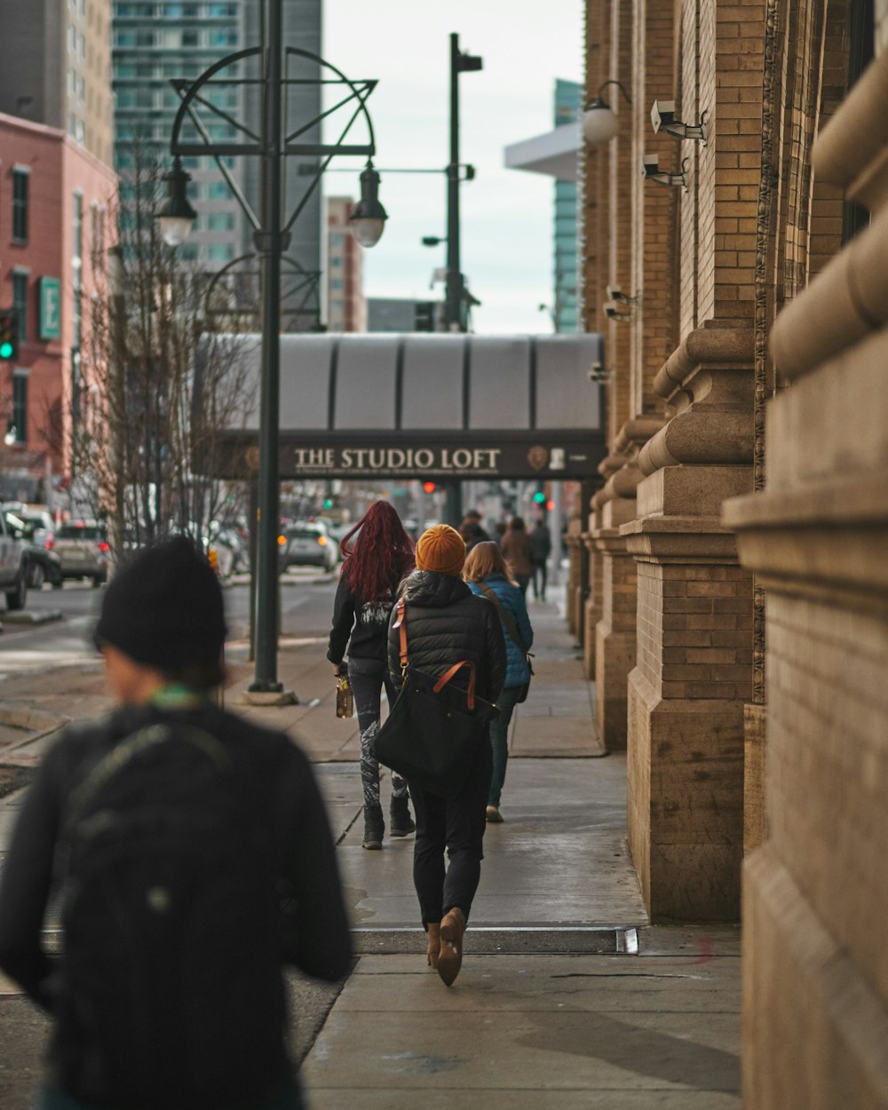 people walking on pedestrian lane during daytime