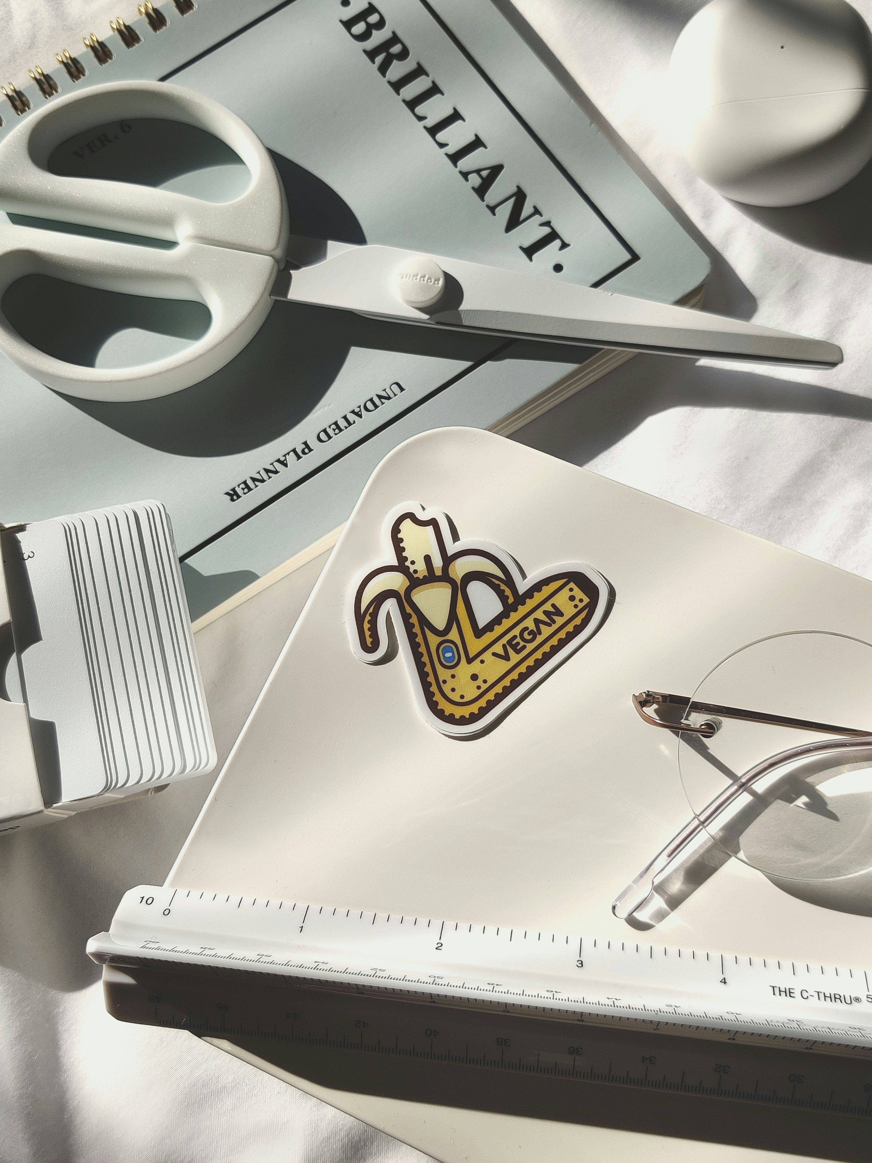 silver fork and bread knife on white paper