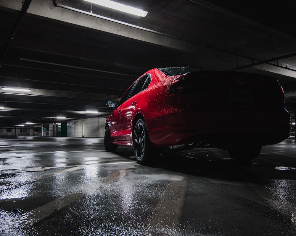 red car parked in parking lot