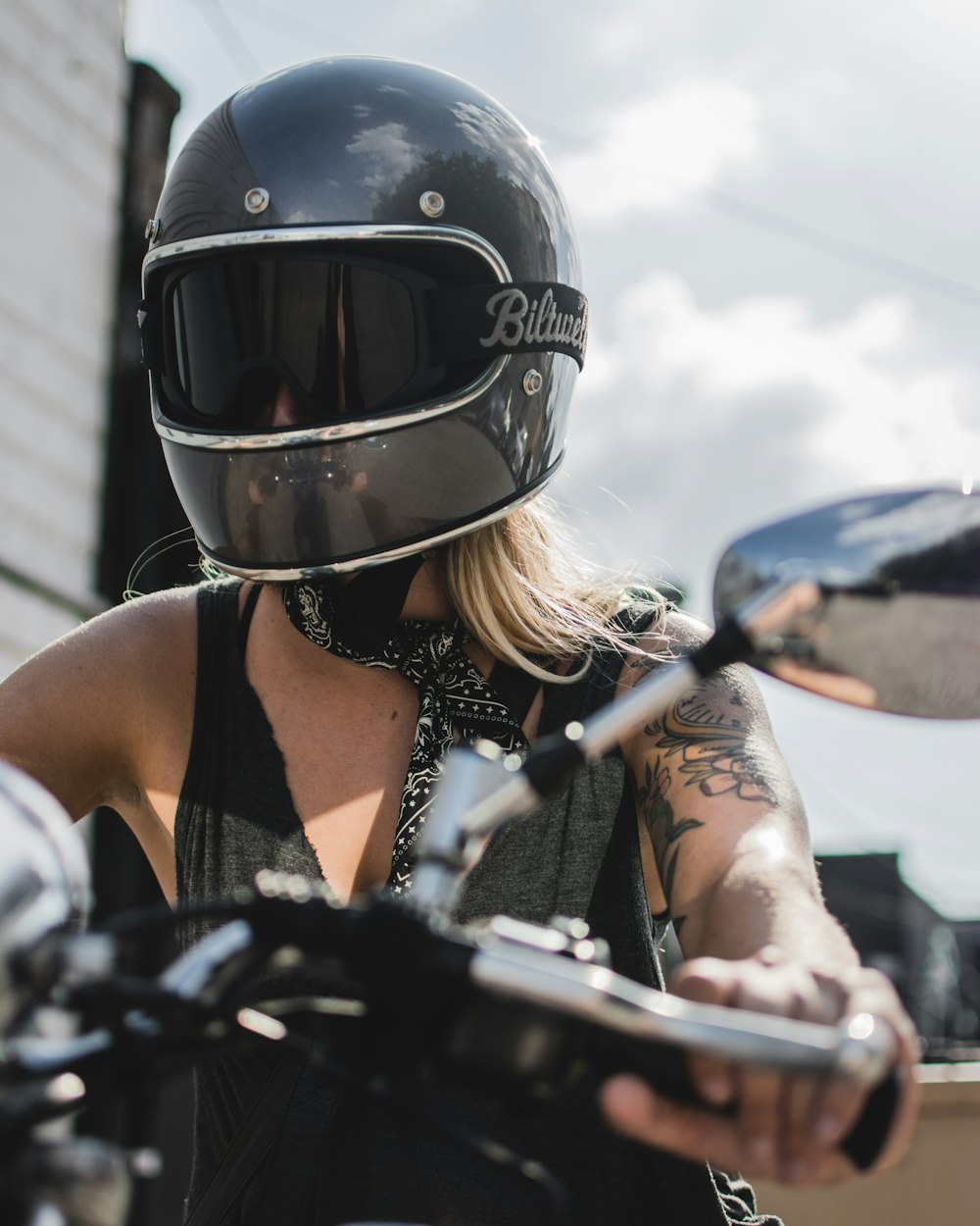 woman in black helmet and black tank top