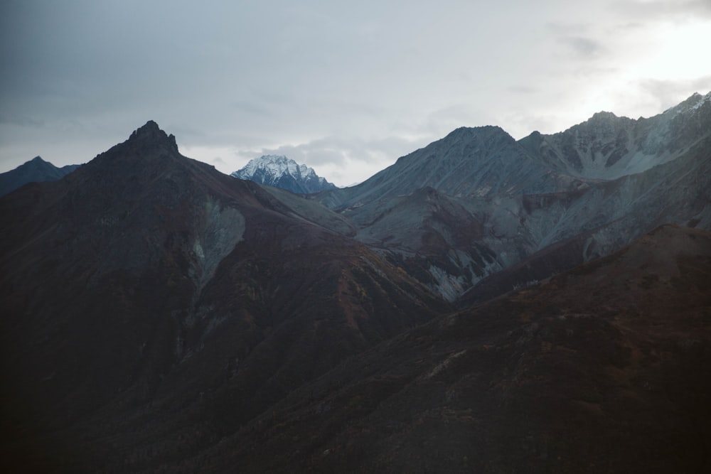 black and white mountains under white sky during daytime