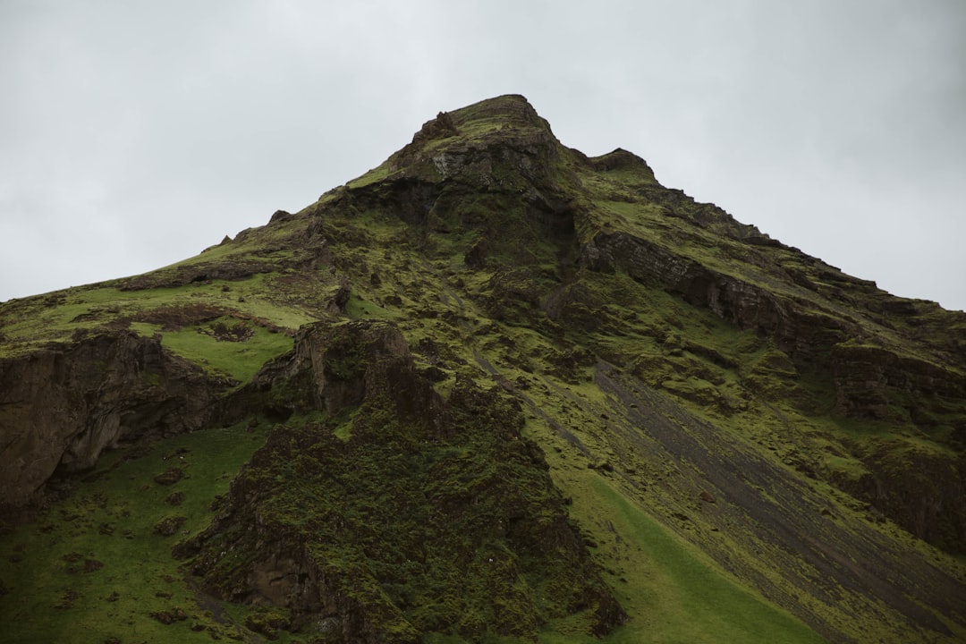 green mountain under white sky during daytime