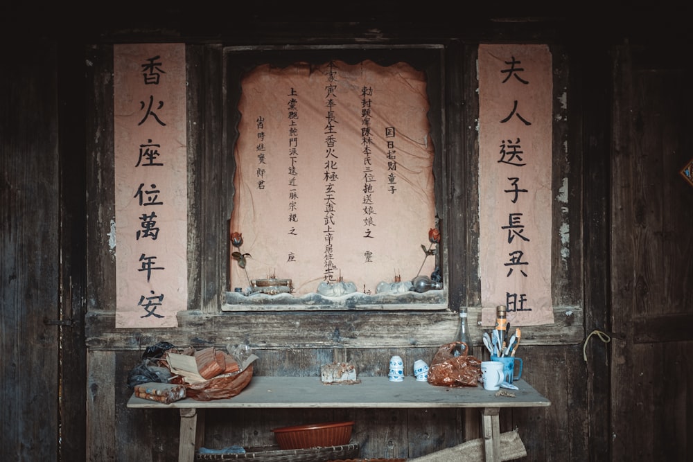 brown wooden table with blue and white ceramic bowl on top