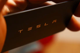 black rectangular device on hand