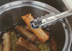 stainless steel fork on stainless steel round plate