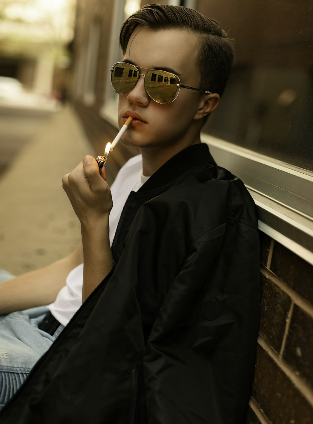 man in black jacket smoking