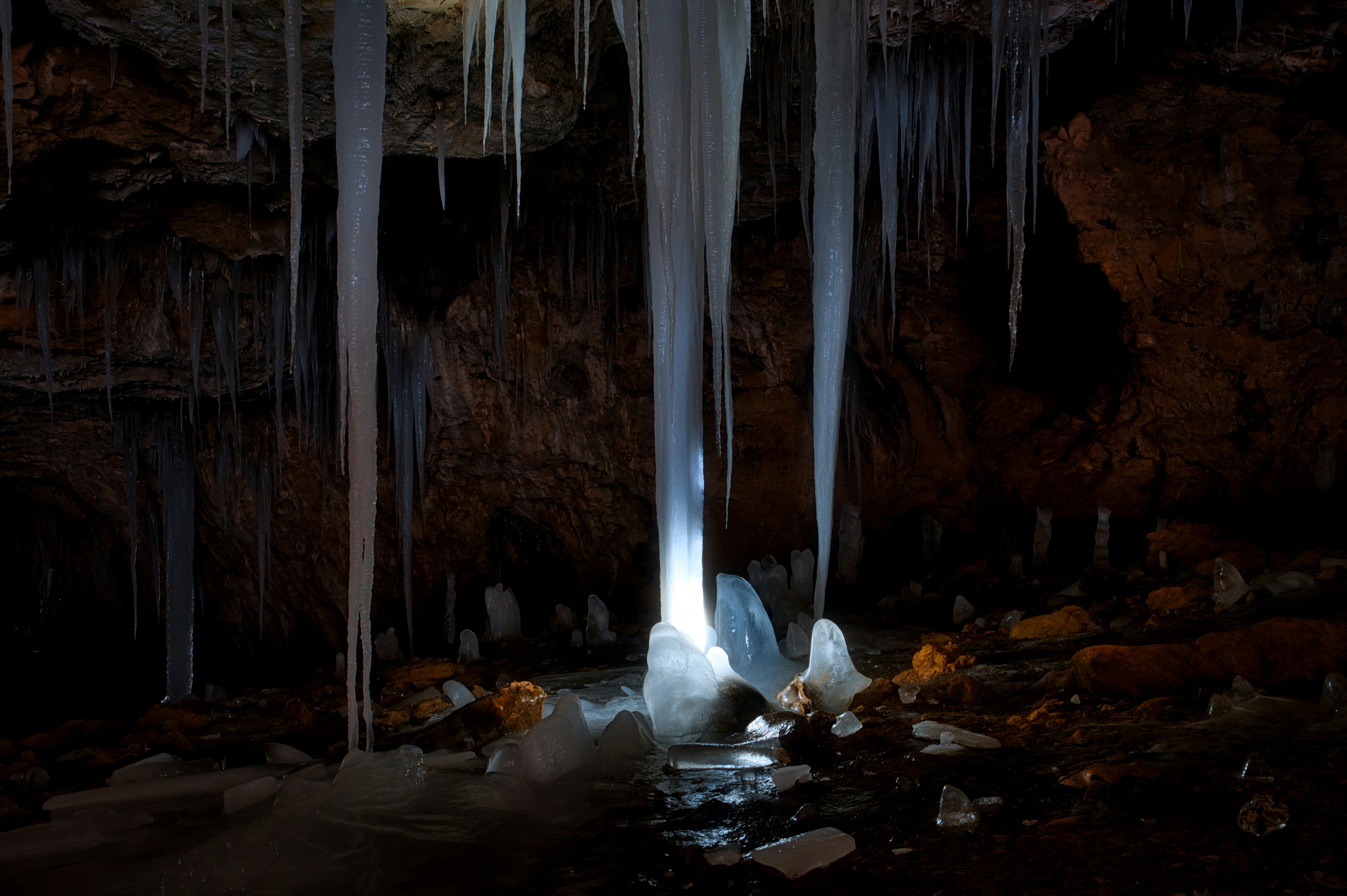 white ice on water during daytime
