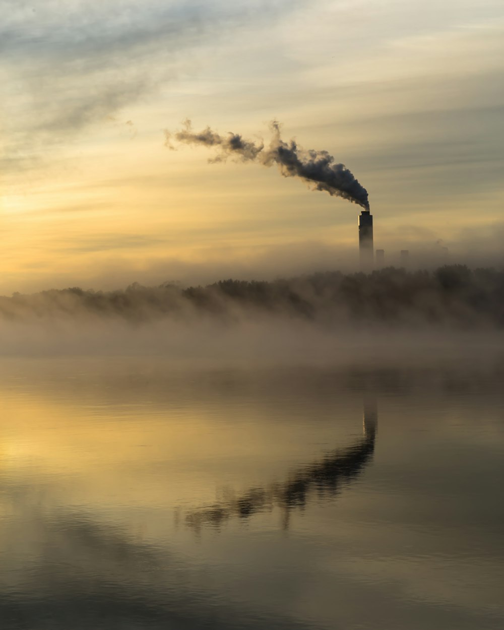 white clouds over body of water