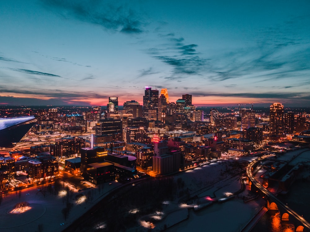 city with high rise buildings during night time