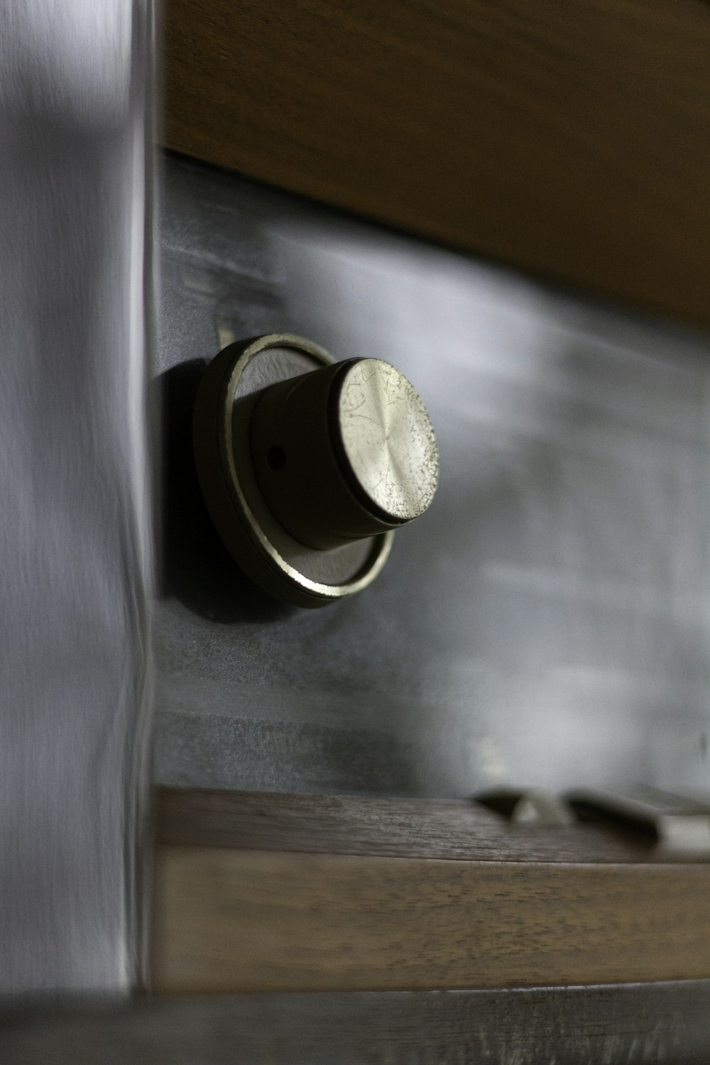 silver round container on silver surface