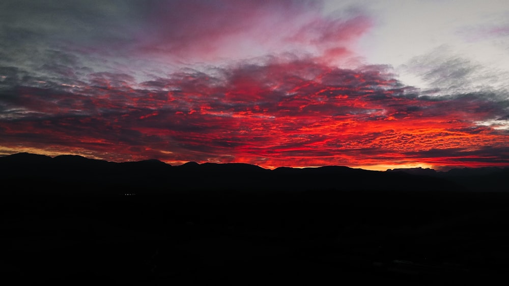 silhouette of mountain during sunset