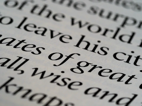 A warm, peach-toned editorial layout featuring elegant serif fonts highlighting client project highlights.
