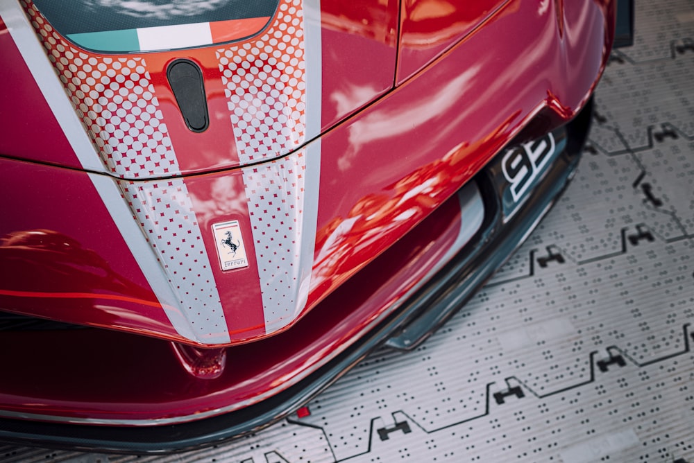 red ferrari car on road