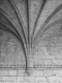 An intricate stone archway from an ancient cathedral.