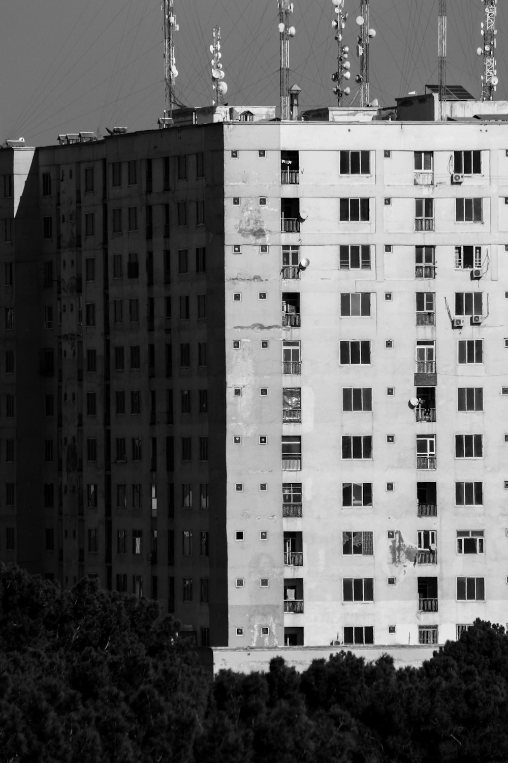 grayscale photo of high rise building