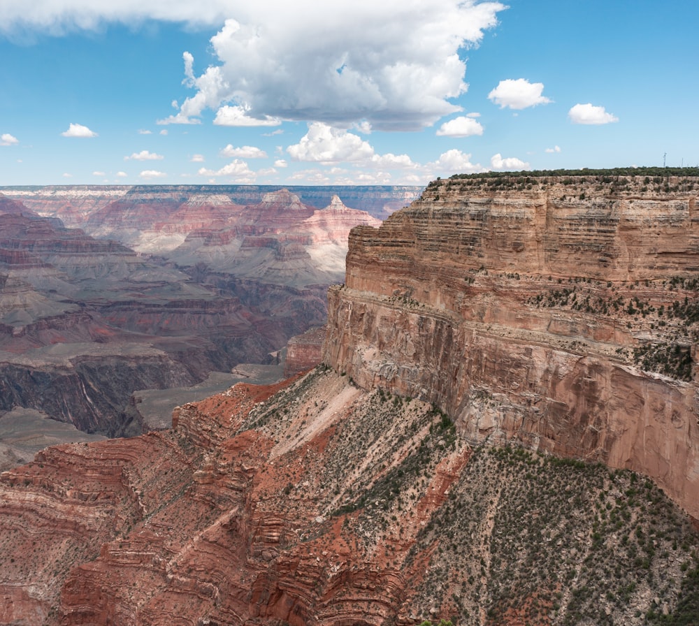 brown rocky mountain under blue sky during daytime