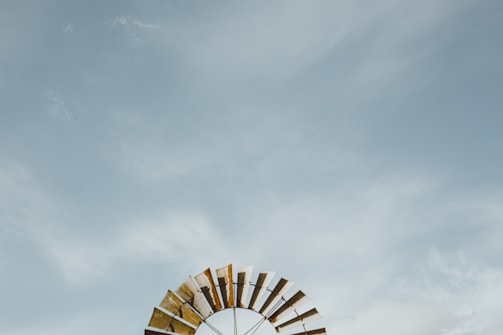 An overview of a completed windmill project against a clear blue sky.