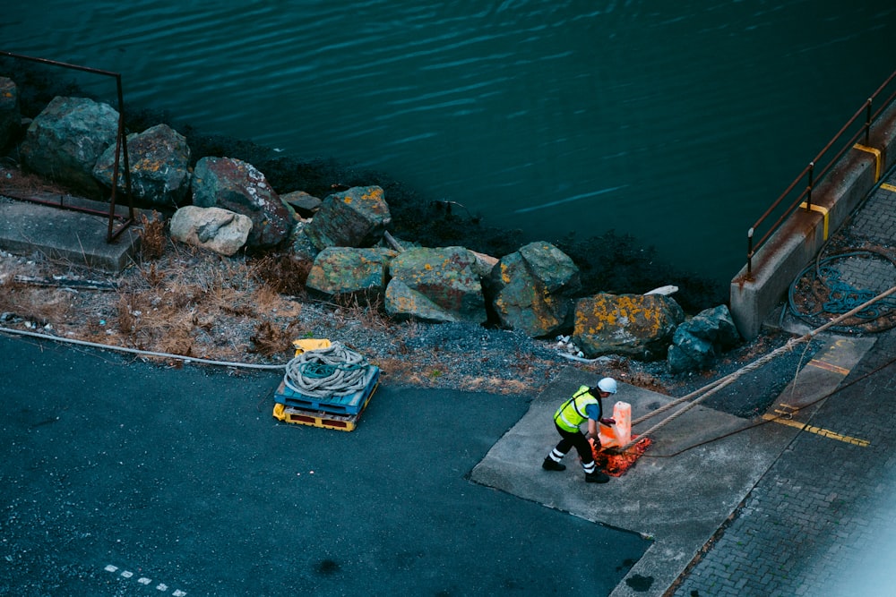 yellow and blue boat on body of water during daytime