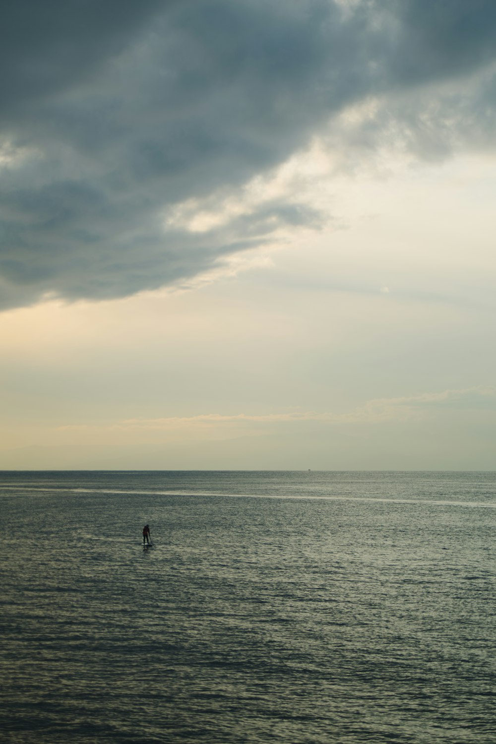 person in body of water during daytime