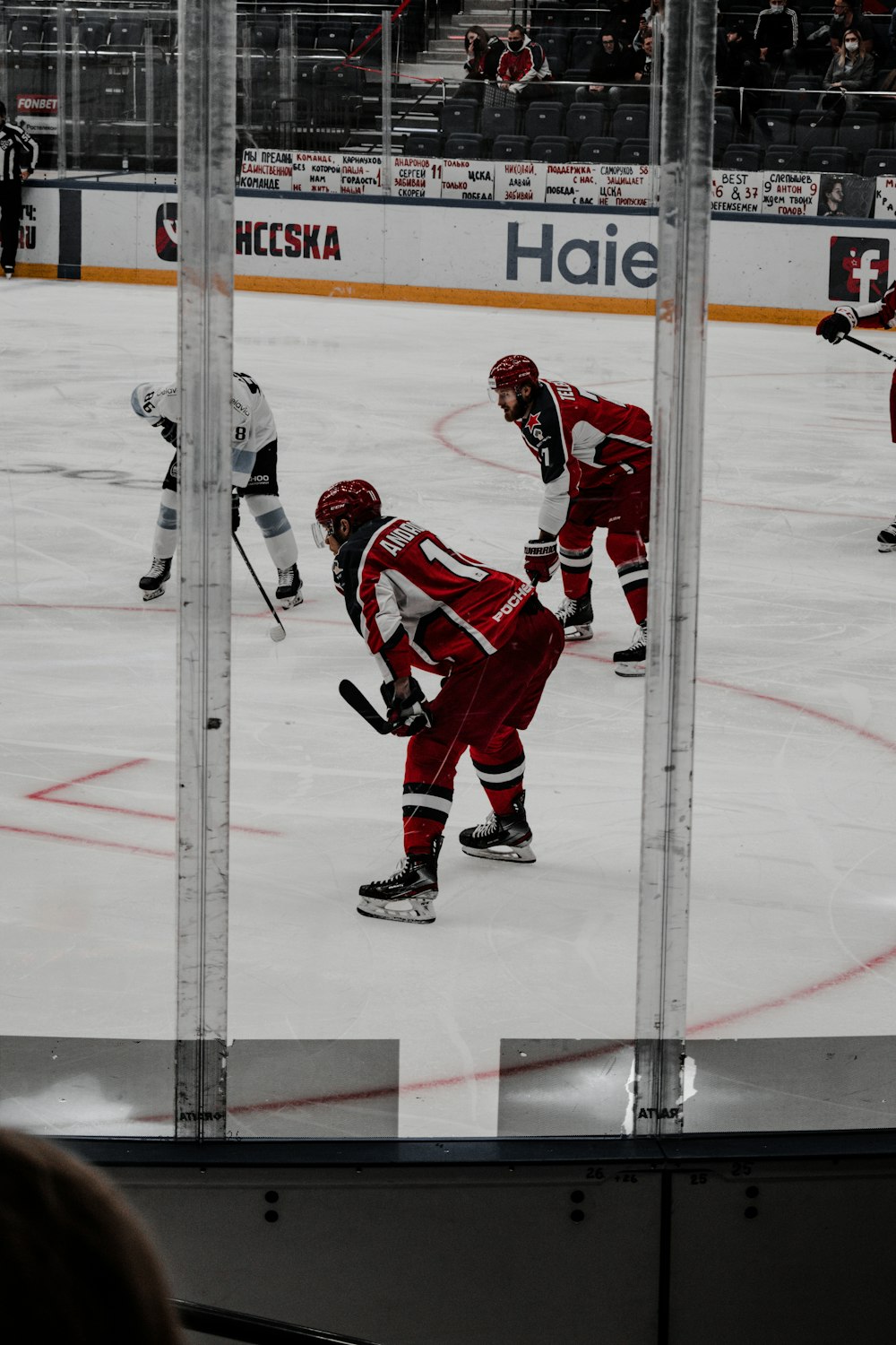 ice hockey players on ice hockey field