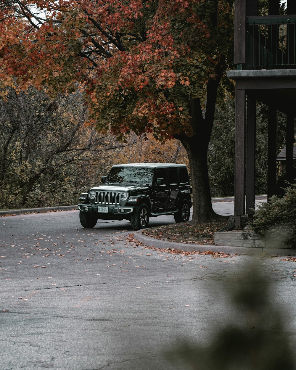 black jeep wrangler on road during daytime