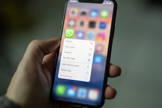 person holding black android smartphone