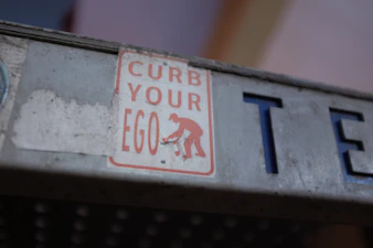 a close up of a street sign on a pole
