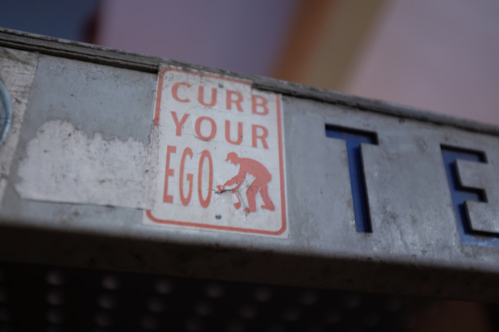 a close up of a street sign on a pole