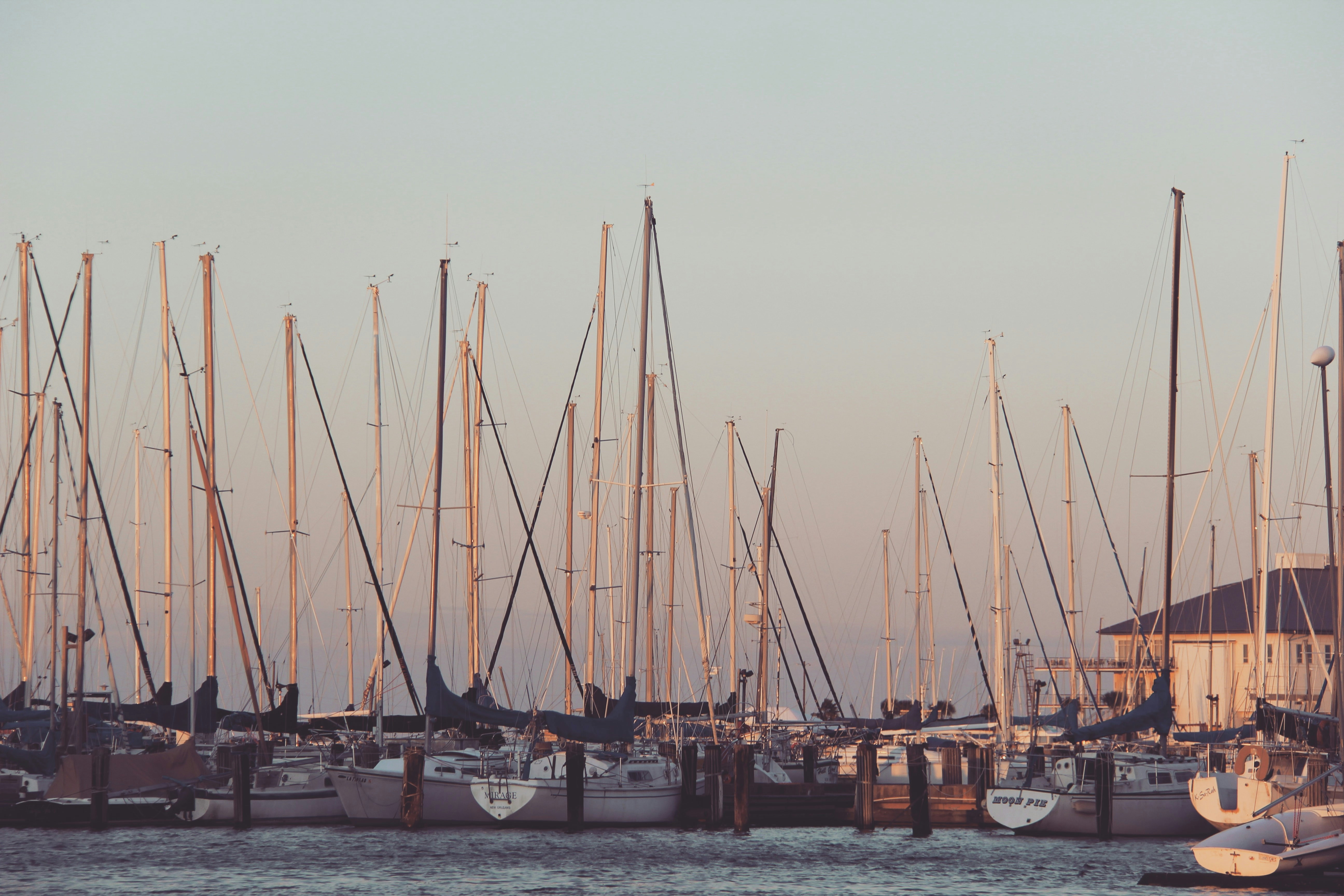 white and brown boat on sea during daytime