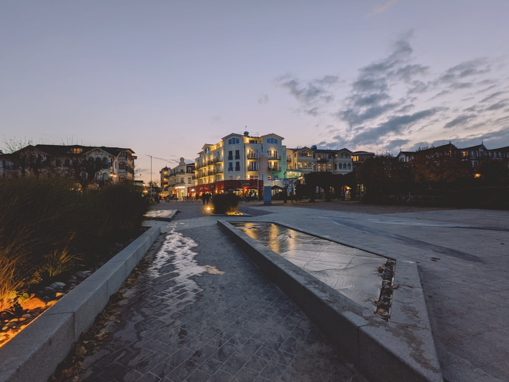 cars on road near buildings during daytime