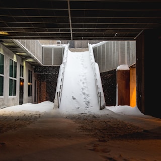 white snow covered ground in building