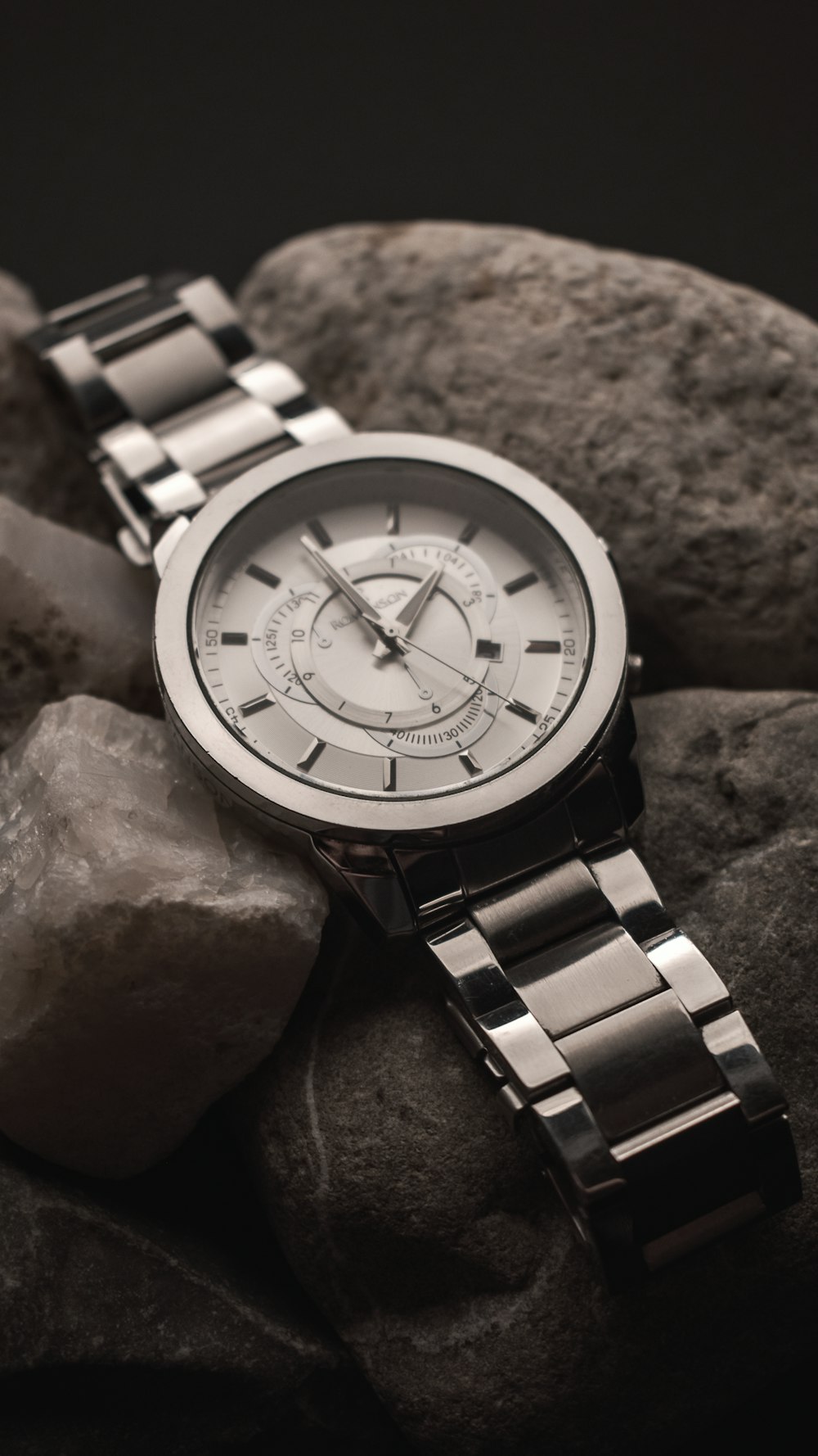 silver link bracelet round analog watch at 10 00