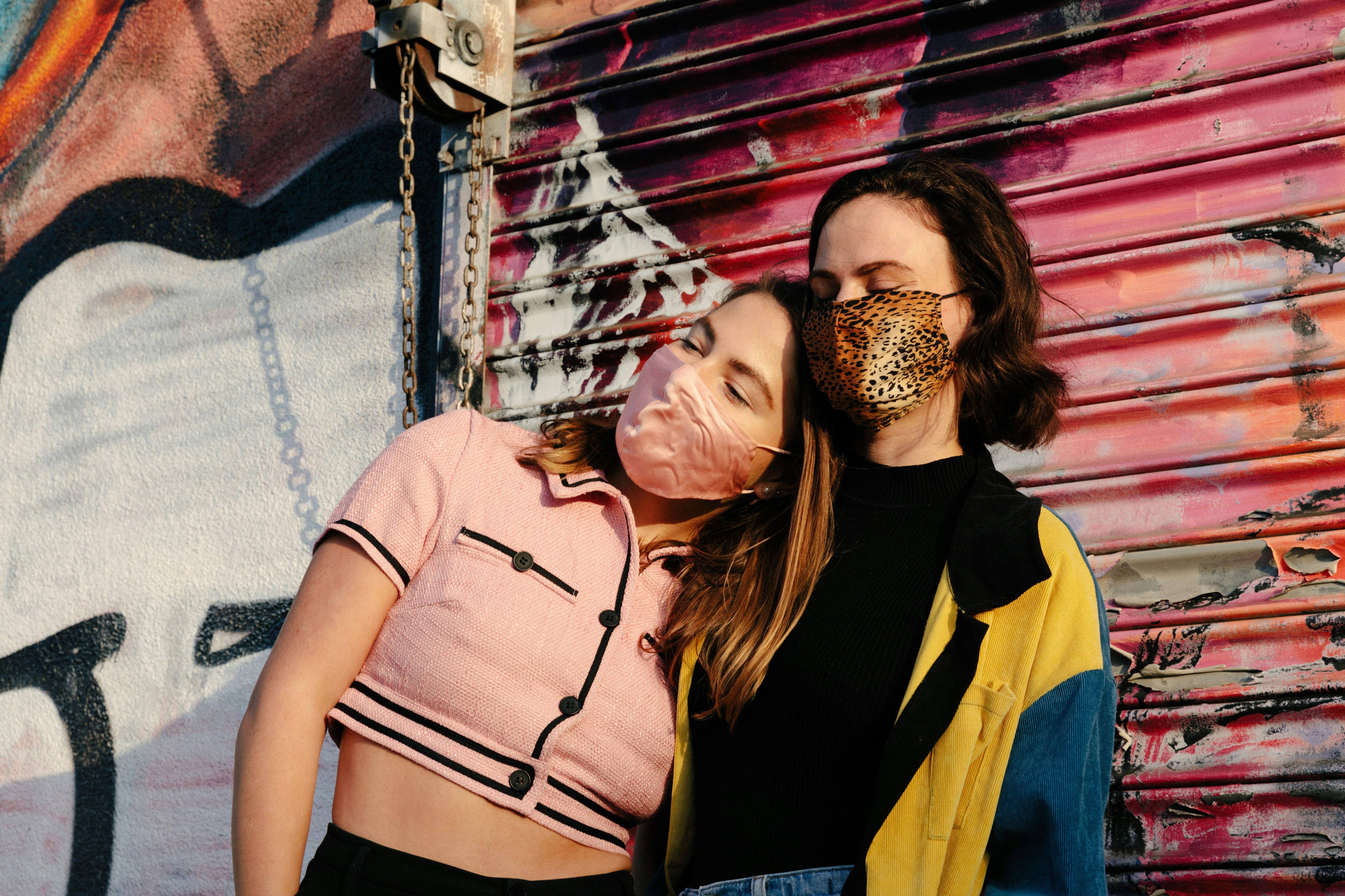man in black crew neck t-shirt beside woman in yellow and black sleeveless shirt