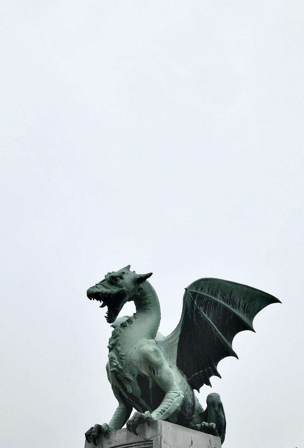 white horse statue in close up photography