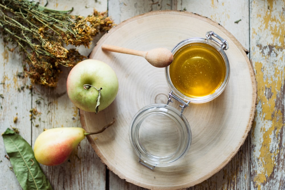 green apple fruit on clear glass mug