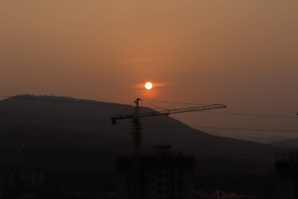 silhouette of tower during sunset